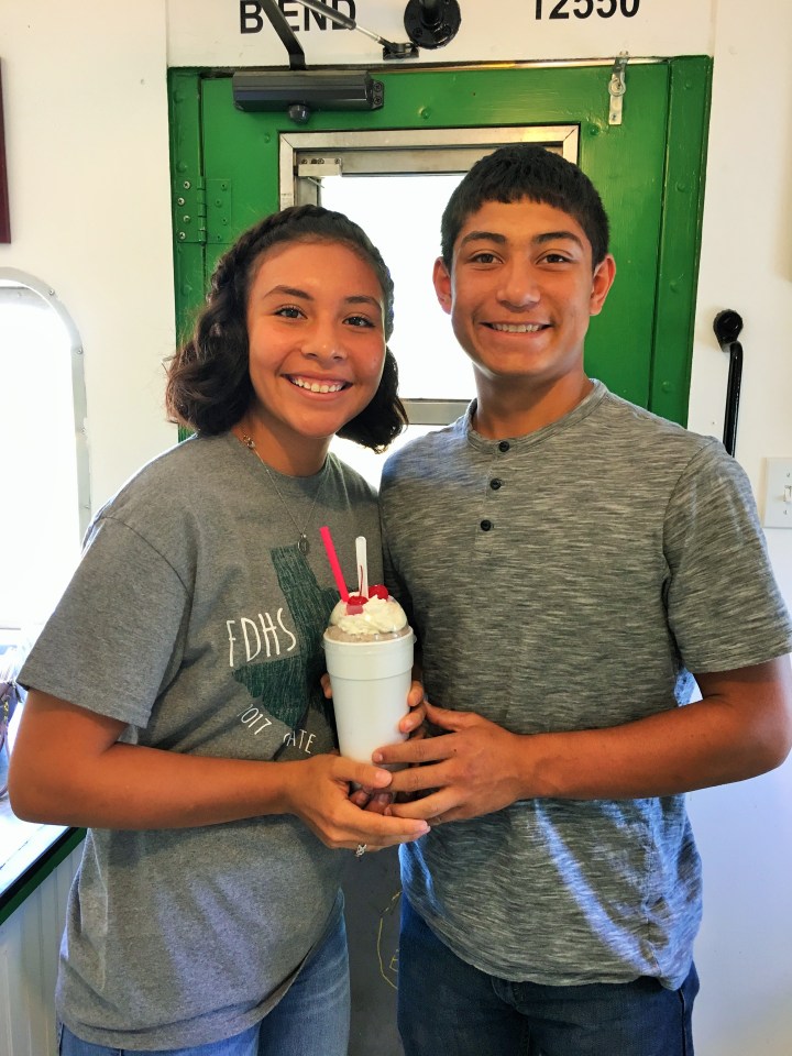 Yani Ponce and Troy Hernandez enjoy the shakes at the Caboose.