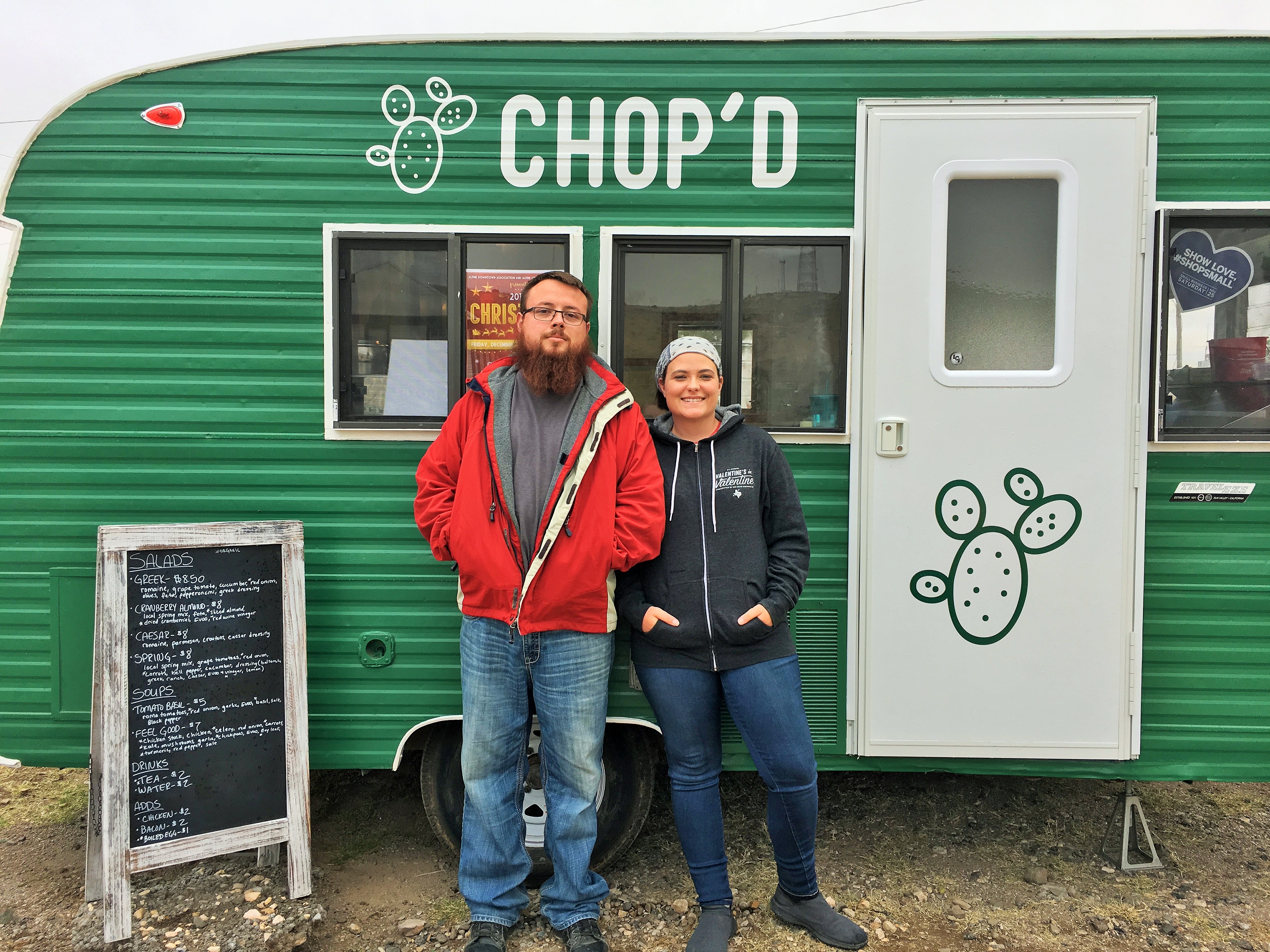 Emily and Jonathan Herrera in front of Chop'd.