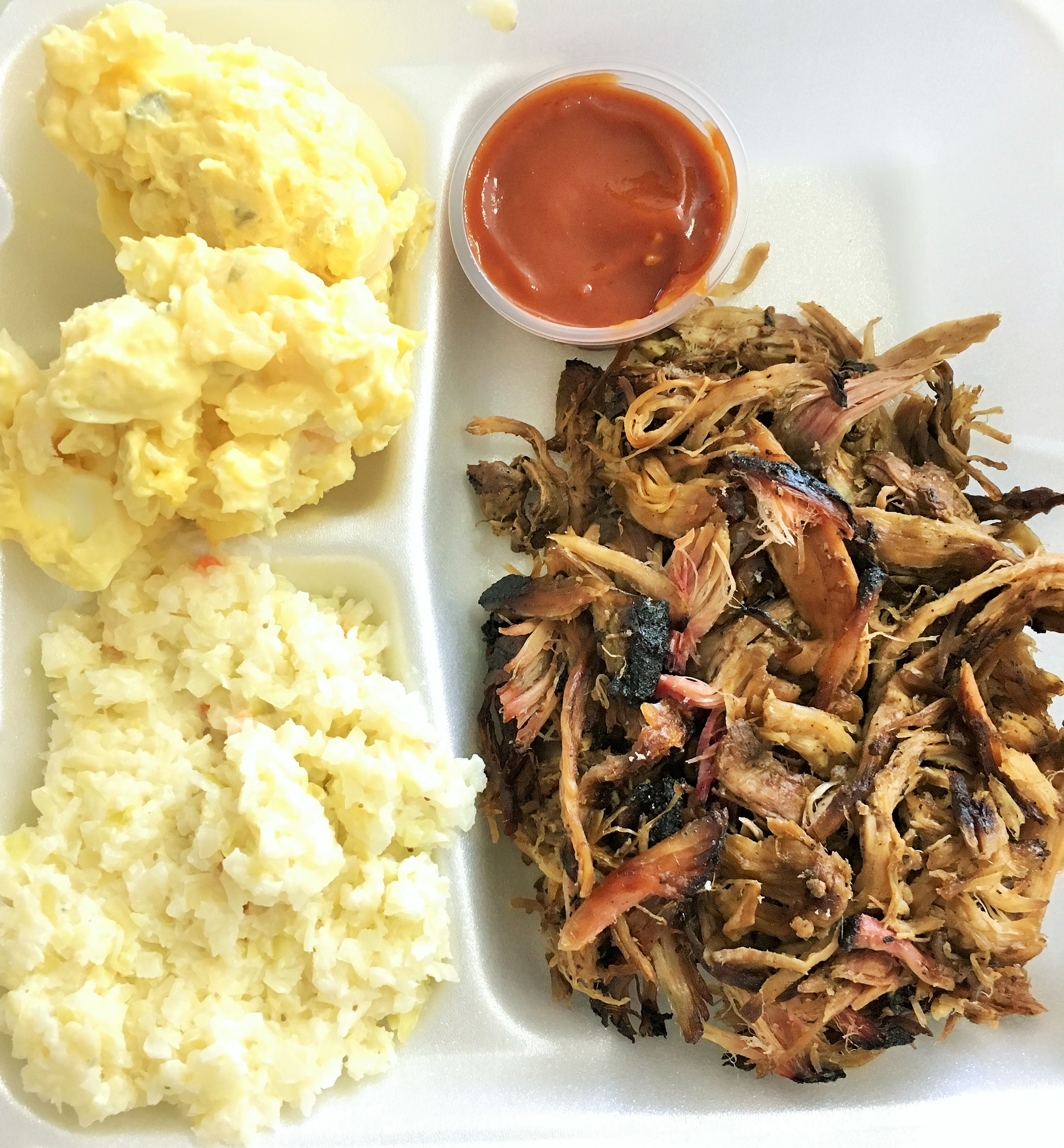 Pulled pork plate with mustard potato salad and coleslaw