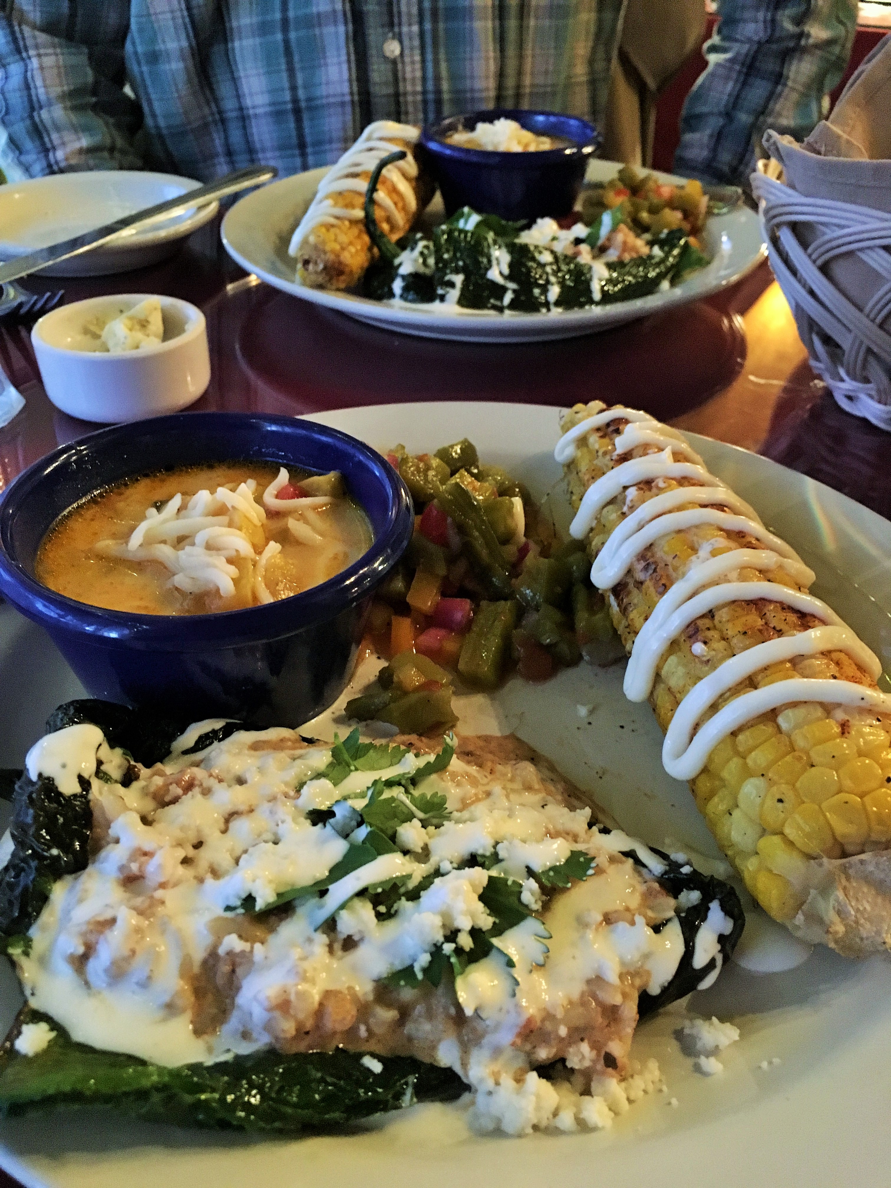 Stuffed poblano pepper, squash, cactus salad and roasted corn were delicious.