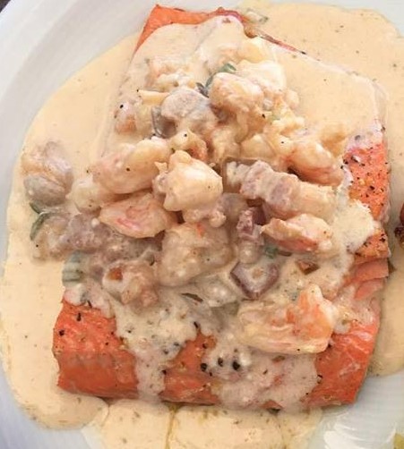 Wild caught Alaskan Sockeye Salmon with Cajun Creamy Shrimp sauce... it doesn't get much better than this.