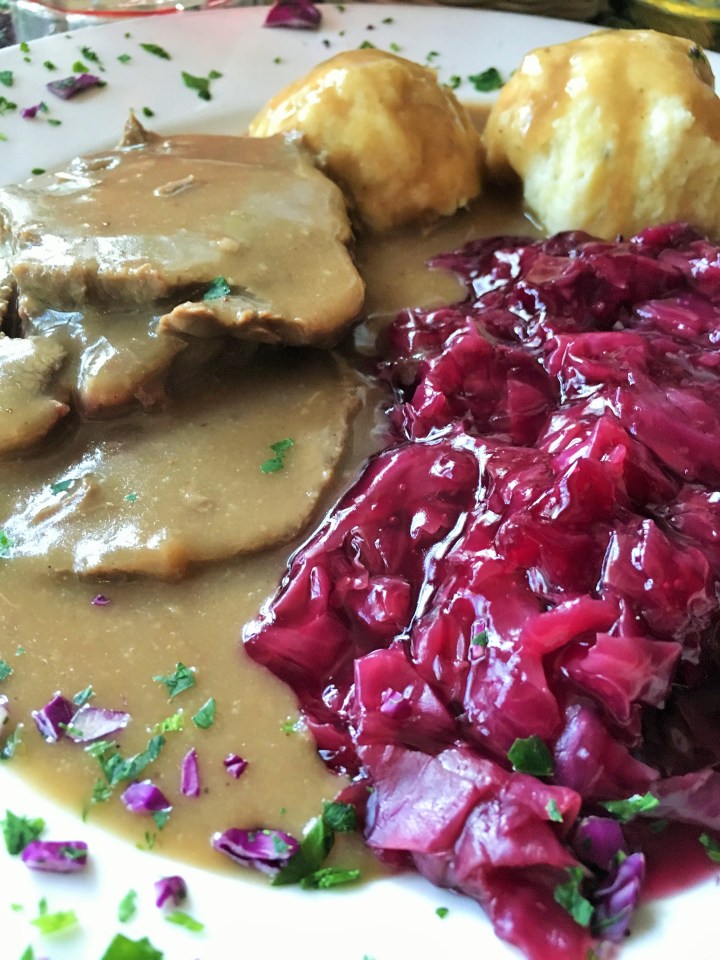 Sauerbraten with red cabbage and bacon potato dumplings