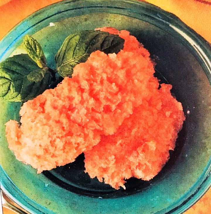 Watermelon sorbet, garnished with mint from the herb garden.