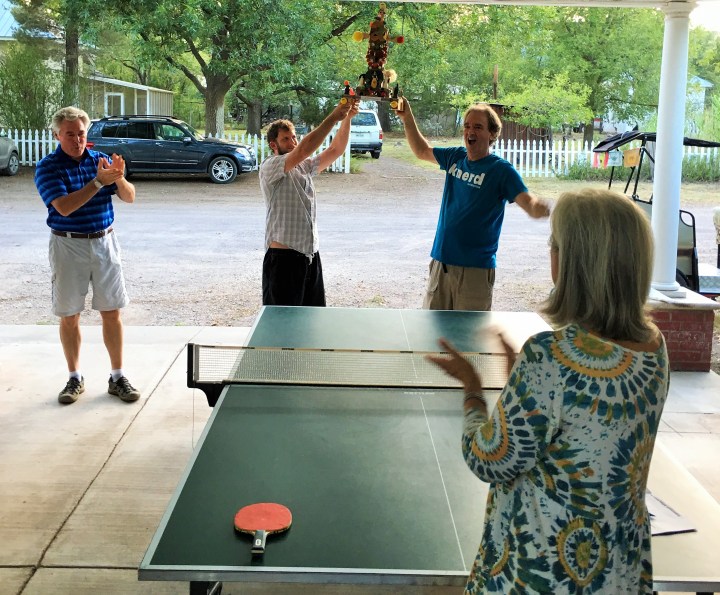 Left to right, Joe Duncan, Bill Manhart, Stephen Bright, Lanna Duncan with the much-coveted traveling trophy rumored to be created by Marfa artist Camp Boswell.