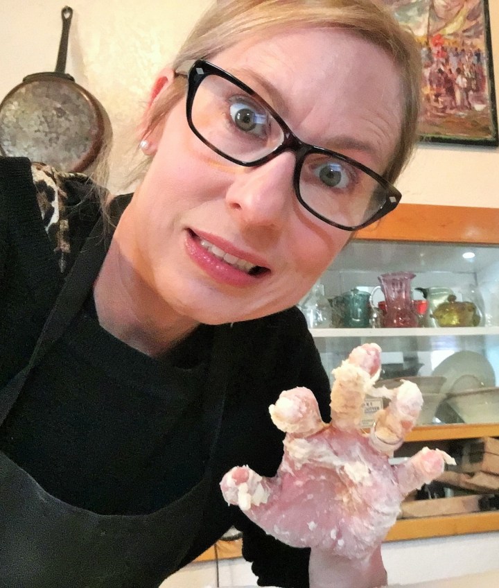 Use your hands. It's going to be sticky at first.